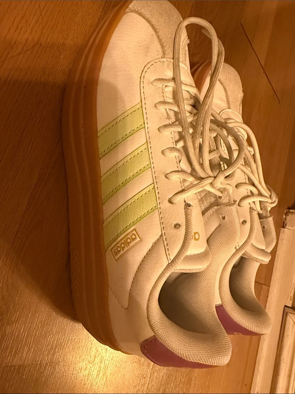adidas women’s White Sneakers with Gum Sole and Light Green Stripes